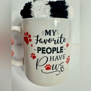 Pet mug and pair of fuzzy penguin socks. Adorable mug with paw prints & socks